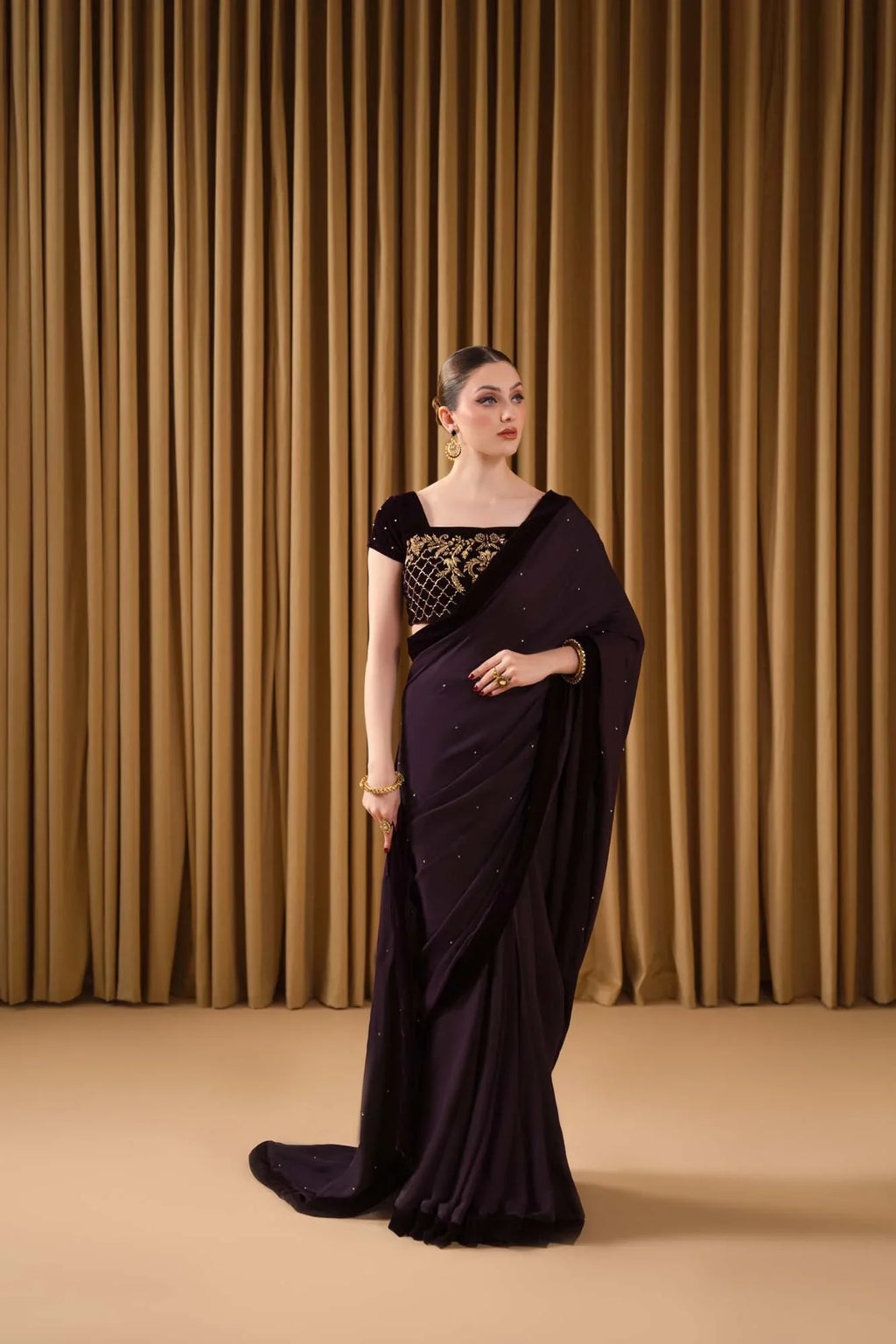 Nureh formal saree by Uzman Yasen