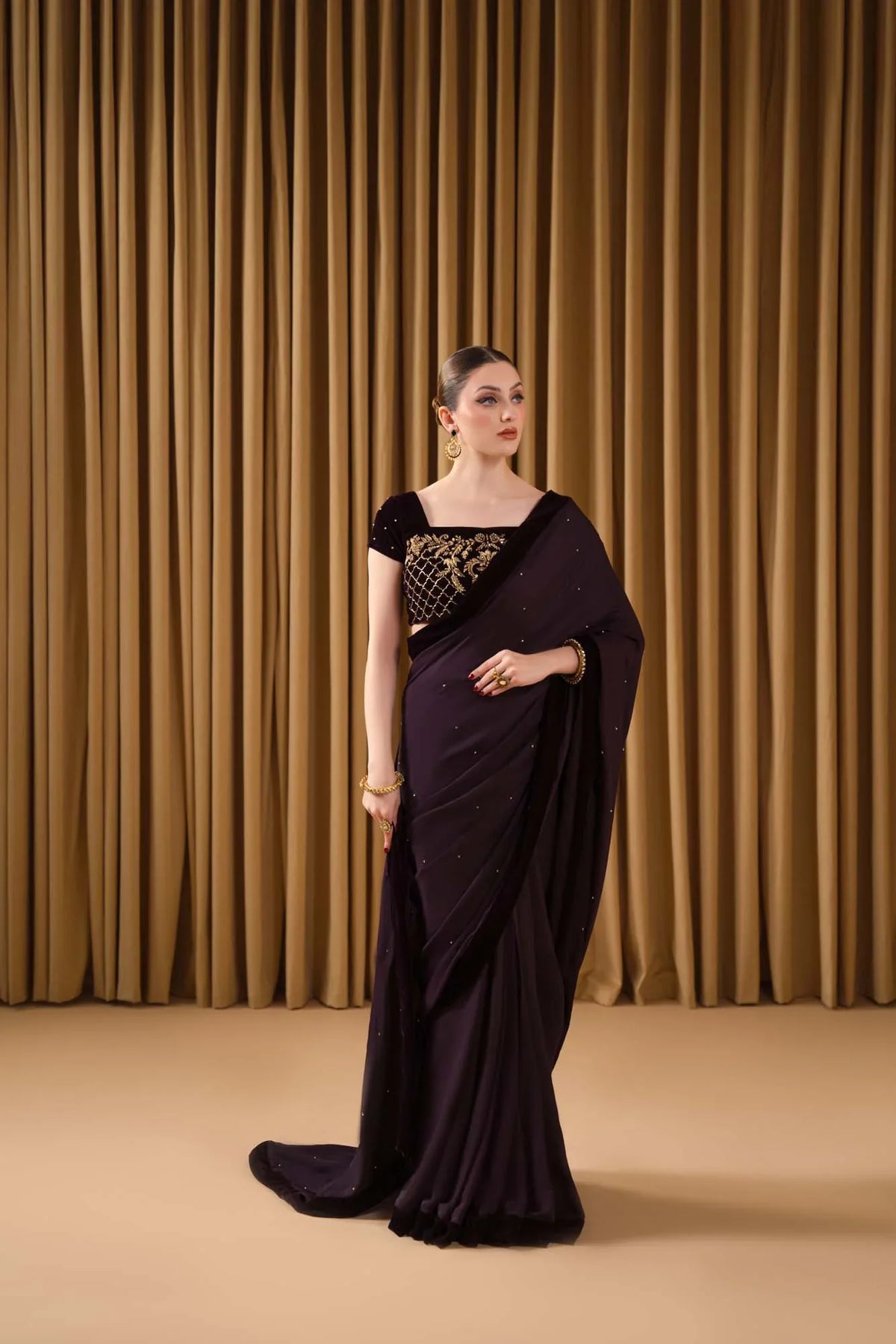 Nureh formal saree by Uzman Yasen